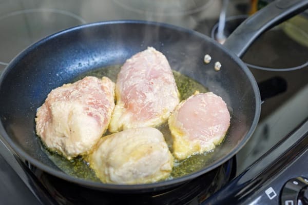 how to fry chicken thighs in a pan